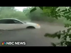 Officers rescue infant from flooded car in Texas as storms snarl holiday travel