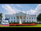 WATCH LIVE: White House raises flags on new poles gifted by Trump