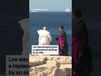 Pope Leo's skullcap was swept away by strong winds during a visit to Lampedusa