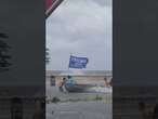 Pro-Trump boaters speed down flooded Tampa street ahead of Hurricane Helene