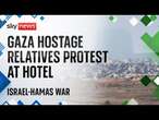 Watch: Relatives of hostages held in Gaza gather outside hotel in Tel Aviv