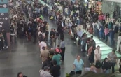 Caos en el AICM tras suspender operaciones por fuertes lluvias (Video)