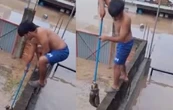 Niño salva a un gato de las inundaciones en Poza Rica, Veracruz (Video)