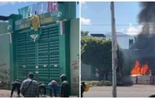 Estudiantes protestan y lanzan petardos en otra instalación militar por normalistas de Ayotzinapa