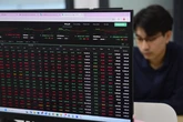 Chứng khoán Mỹ 'nhuộm đỏ' vì căng thẳng Mỹ - Trung, VN-Index được dự báo ra sao?