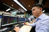 Chứng khoán lần đầu vượt mốc 1.600 điểm nhưng... chóng vánh
