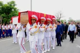 Đón 28 hài cốt liệt sĩ quân tình nguyện và chuyên gia Việt Nam từ Lào về an táng