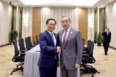 Bộ trưởng Bùi Thanh Sơn tiếp xúc song phương Bộ trưởng Ngoại giao Trung Quốc Vương Nghị
