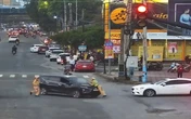 Tạm giữ tài xế hất thiếu tá cảnh sát giao thông lên ca pô xe ô tô