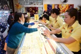 Đọc nhanh 12-6: Chứng khoán Mỹ vọt lên, giá vàng thế giới đảo chiều sau chuỗi giảm