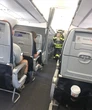 Chuyến bay American Airlines hạ cánh khẩn vì thiết bị của hành khách bốc cháy