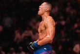 Võ sĩ gốc Việt đấm sưng mặt đối thủ, lập kỷ lục tại UFC