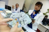 Giá USD ngân hàng giảm 302 đồng/USD chỉ sau hai ngày