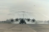 Tradisi Penyiraman Air Warnai Kedatangan Pesawat Angkut Raksasa Airbus A400M TNI AU