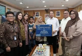TASPEN Salurkan Manfaat JKK dan JKM Rp 1,08 Miliar Kepada 2 Keluarga ASN di Riau