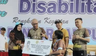 Gaungkan Inklusi, Reda Manthovani & Ribuan Penyandang Disabilitas Pecahkan Rekor MURI