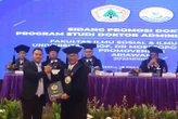 Ketua KWP Ariawan Resmi Bergelar Doktor Administrasi Publik dengan Nilai Cum Laude