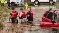 Watch: Florida driver ‘slowly sinking in mud’ rescued by firefighters