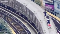 Subway surfers caught travelling on top of moving train by drone team