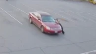 Moment car rams into restaurant twice after failed towing attempt