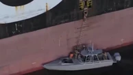 Iranian soldiers appear to seize container ships in Strait of Hormuz