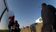 Moment NYPD officer races to grab woman trying to jump off bridge