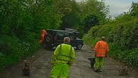 Land Rover driver ignoring closed road knocks over pothole worker