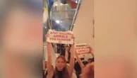 Pharrell confronted by animal rights activists at Olympics party