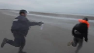 French police use pepper spray on migrants trying to cross Channel