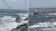 Ten people rescued after sailboat hits rocks on Jersey shore