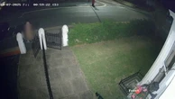 Watch: Masked naked man walks street at night investigated by police