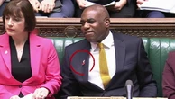 Moment Lammy puts poppy on midway through PMQs
