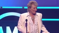 Rod Stewart swears live at AMAs as children make surprise appearance