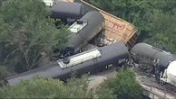 Video shows mangled train cars on top of each other after derailment