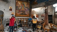 Syria priest on moment suicide bomber entered church, killing dozens