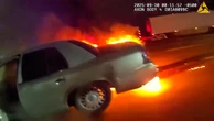 Hero cop pulls suspected drunk driver from burning car after a crash