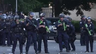 Police use tear gas and flash grenades to disperse LA protesters