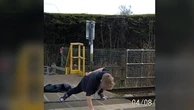 Youth caught on CCTV doing pushups on level crossing