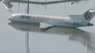 Plane submerged in floodwater as heavy rain devastates Brazil airport