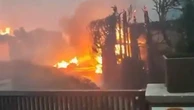 Terrifying moment Madrid homes threatened by raging wildfire