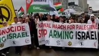 Hundreds brave torrential rain for pro-Palestine protest in London