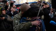 Emotional reunions in Ukraine as hundreds of prisoners of war return