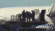 Charlie Kirk’s wife Erika clutches Usha Vance’s hand as casket arrives