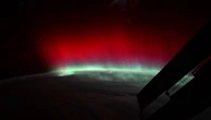 Rare red aurora glows above Earth in extraordinary space video
