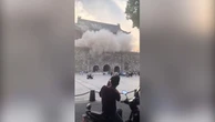 Tourists flee as 600-year-old tower roof collapses in China