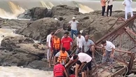Watch: Rescuers on scene as bridge collapses into river in India