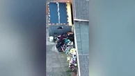Watch: Drug dealer launches bin bag of cocaine and heroin over fence