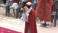 Humanoid robot becomes buddhist monk in ceremony at Seoul temple