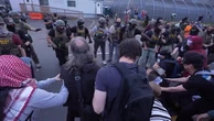 Anti-ICE protesters and federal agents clash outside detention center