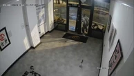 Moment Banksy burglar breaks into gallery and steals print of the wall